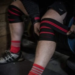 Harbinger Red Line Knee Wraps 9 Harbinger Red Line Knee Wraps -The Fitness Equipment Store 9a1756fd0c741126d7bbd4b692ccbd91 5d0a752575de5 600x600 1